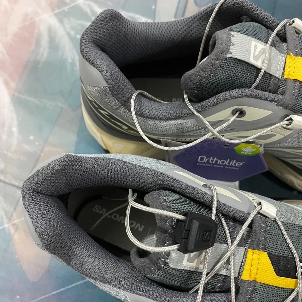 Salomon Men's Grey Athletic Trail Shoes with Yellow & Blue Accents